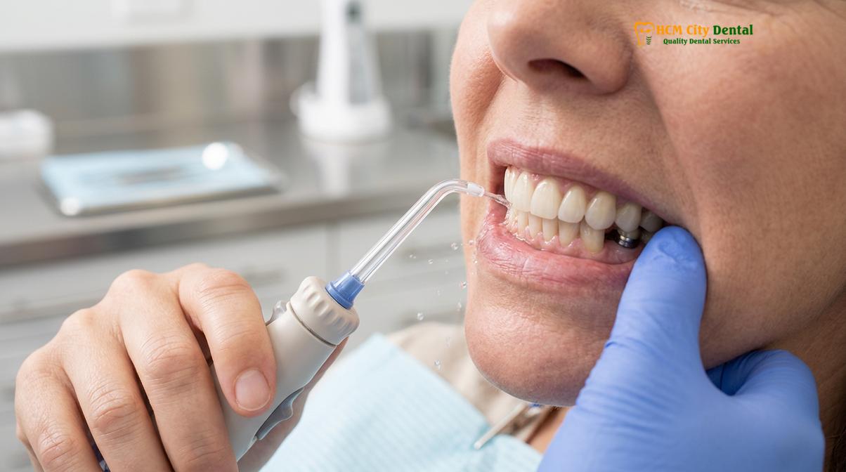Visual description of how to clean under dental bridge